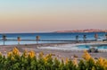 View of the hotelÃ¢â¬â¢s recreation area on the beach and the sea shore, palm trees under the blue sky of a sunny day Royalty Free Stock Photo